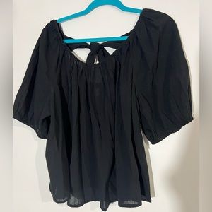 Blouse with bow on the back